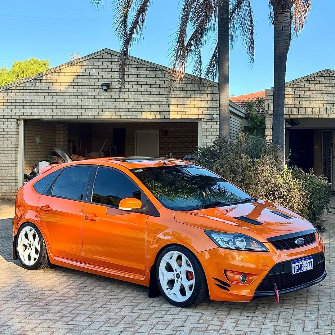 orange performance hatch after detailing by AFW Car Care in Perth, frame 03